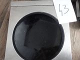 une image représentant une cuisinière avec un brûleur noir dessus