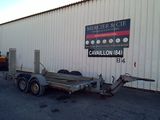 an image of a trailer parked in front of a building