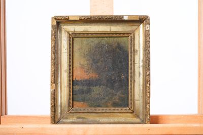 a picture of a painting on a shelf in a room