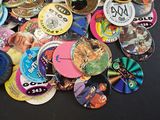 a lot of buttons that are on a table
