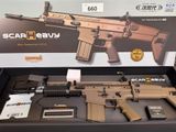 a box with a gun on it that is on display