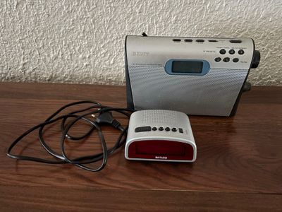 a radio that is sitting on a table next to a charger