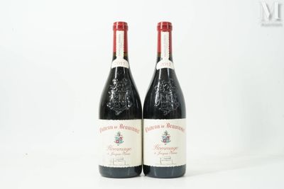 two bottles of wine sitting next to each other on a white surface