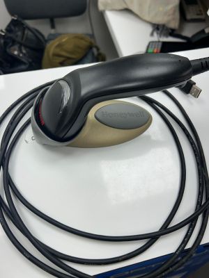 a computer mouse sitting on top of a white table