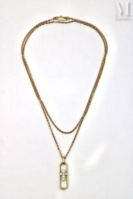 a close up of a necklace with a lock on a chain