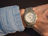 a person that is wearing a watch on his wrist