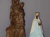 statue of a woman holding a child and a statue of a woman holding a baby