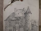 a drawing of a house on a piece of paper