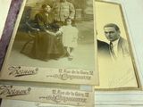 an old photo of a family sitting in a book
