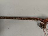 a stick that has a bunch of small flowers on it
