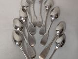 a lot of spoons that are sitting on a table