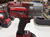 a cordless drill that is sitting on a table