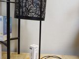 a fan that is sitting on a table next to a fan
