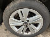 a close up view of a tire on a car