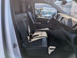 a view of the inside of a truck with the seats down