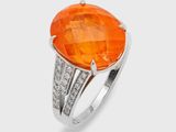 an orange quartz and diamond ring