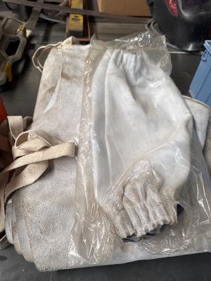 a pair of gloves and a pair of gloves on a table