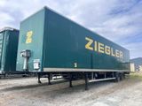 une remorque verte arborant un logo Ziegler jaune