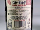 a bottle of wine with a price label on it