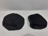 pair of black seat covers for a car with a white background
