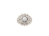 a close up of a diamond ring on a white background