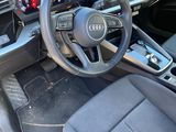 dashboard of a car with a steering wheel and dashboard controls