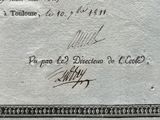 a close up of a stamp on a piece of paper