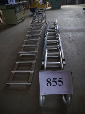a lot of ladders that are sitting on the floor