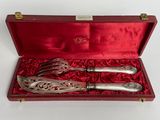 an image of a silverware set in a red box
