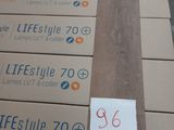 several boxes of life style toilet paper stacked on top of each other