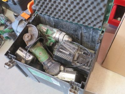 a tool box with tools in it on the floor