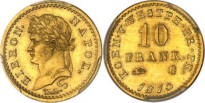 a gold coin with a woman ' s head and a crown on it