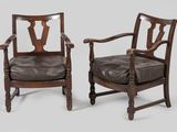 two wooden chairs with brown leather cushions and wooden legs