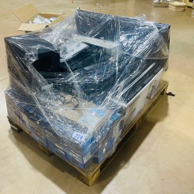 a couch that is wrapped in plastic and sitting on a pallet