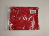 a close up of a red t - shirt on a white surface