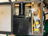 a box with a cell phone inside of it on a table