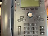 a telephone that is sitting on a desk