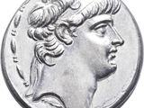 a close up of a coin with a woman ' s head on it