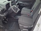 the interior of a car with a steering wheel and a dashboard