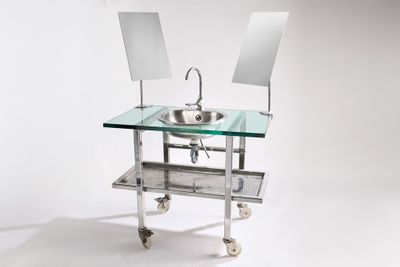 a sink with a mirror and a mirror on it