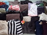a box full of clothes that is sitting on a table