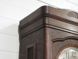 a clock that is on the wall of a building
