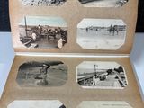 an old photo of a book with pictures of people on the pages
