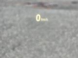 a blurry image of a car ' s dashboard with the number 0 on it