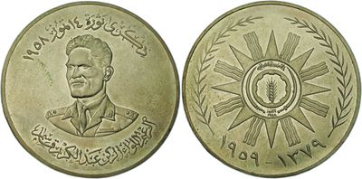 a close up of a coin with a picture of a man on it