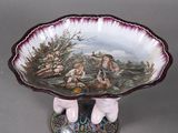 a bowl with a picture of a man and a woman on it