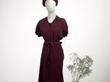 an image of a mannequin dressed in a burgundy dress