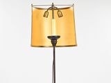 an image of a table lamp with a yellow shade on it