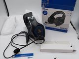 a box with a pair of headphones on top of it