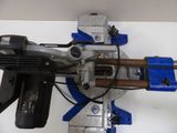 a picture of a machine that is being used to make a hole in the wall